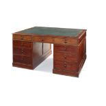 An early Victorian mahogany partner's desk