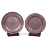 A matching pair of 18th century pewter chargers