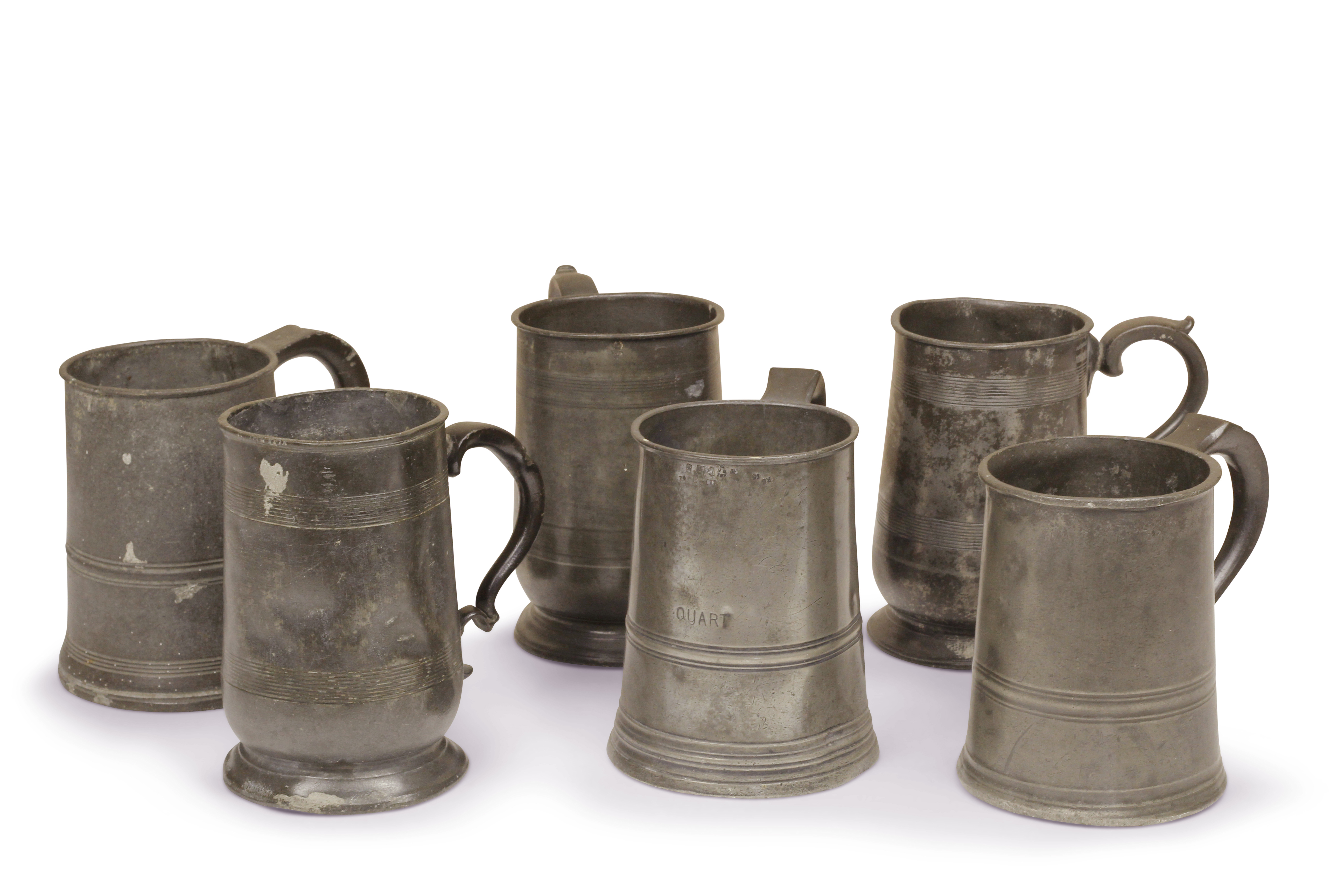 Six 18th century pewter quart handled tankards