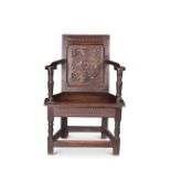 A 17th century style carved oak child's chair