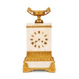 A mid 19th century French gilt bronze and white marble mantel clock
