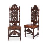 A pair of 19th century carved oak high back chairs in the Marot style