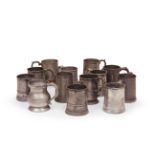 A mixed group of thirteen 18th and 19th century pewter half pint handles tankards