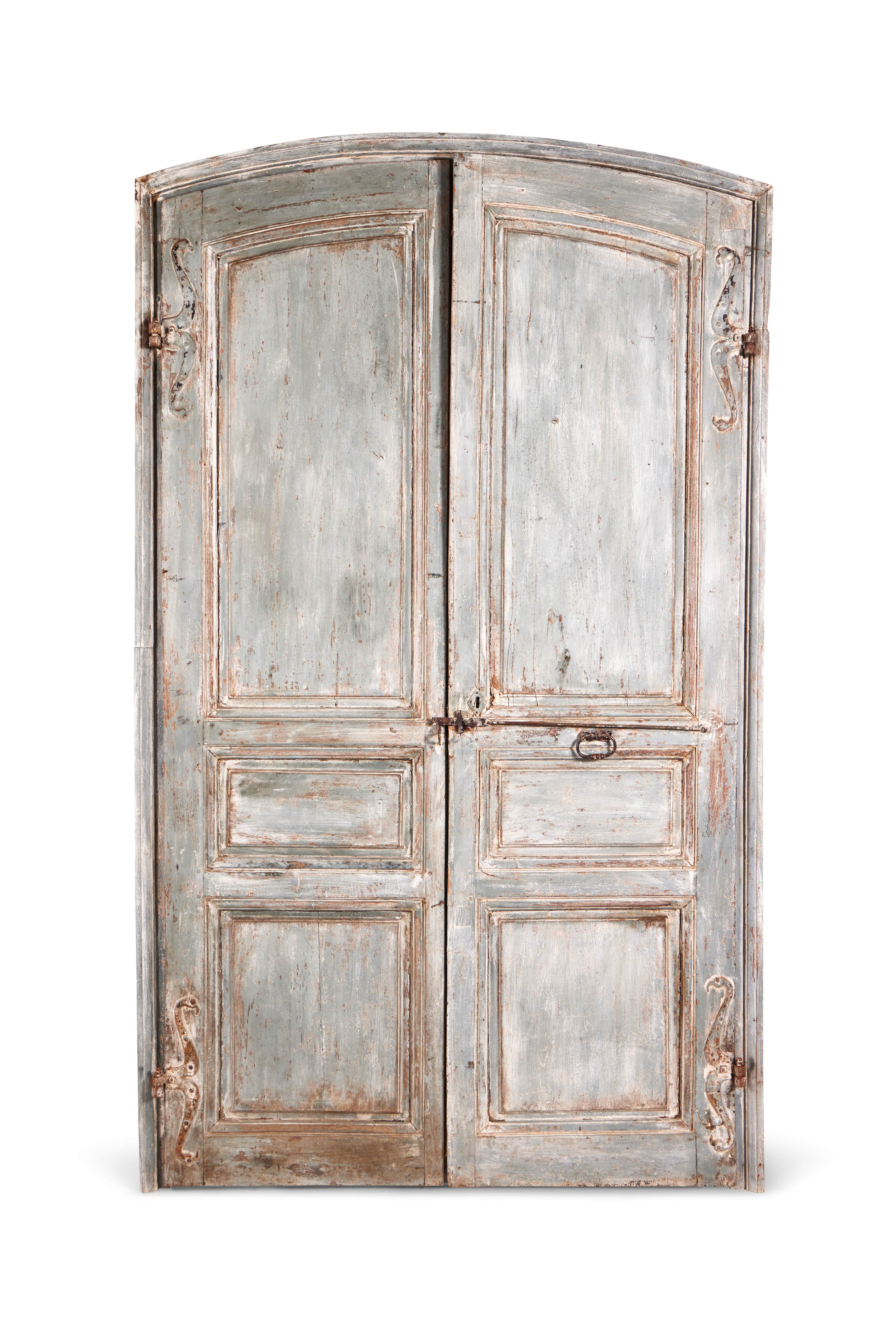 A large pair of 18th century French blue painted doors