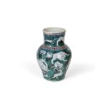 An Isnik green, blue and red glazed vase