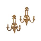 A pair of 19th century Louis XIV style gilt bronze three branch appliques