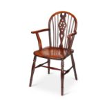 A 19th century ash and elm wheel-back Windsor armchair, Thames Valley