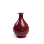 A Chinese sang de boeuf baluster vase