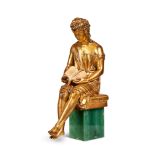 An 18th century Louis XVI ormolu figural mount of a lady sitting reading