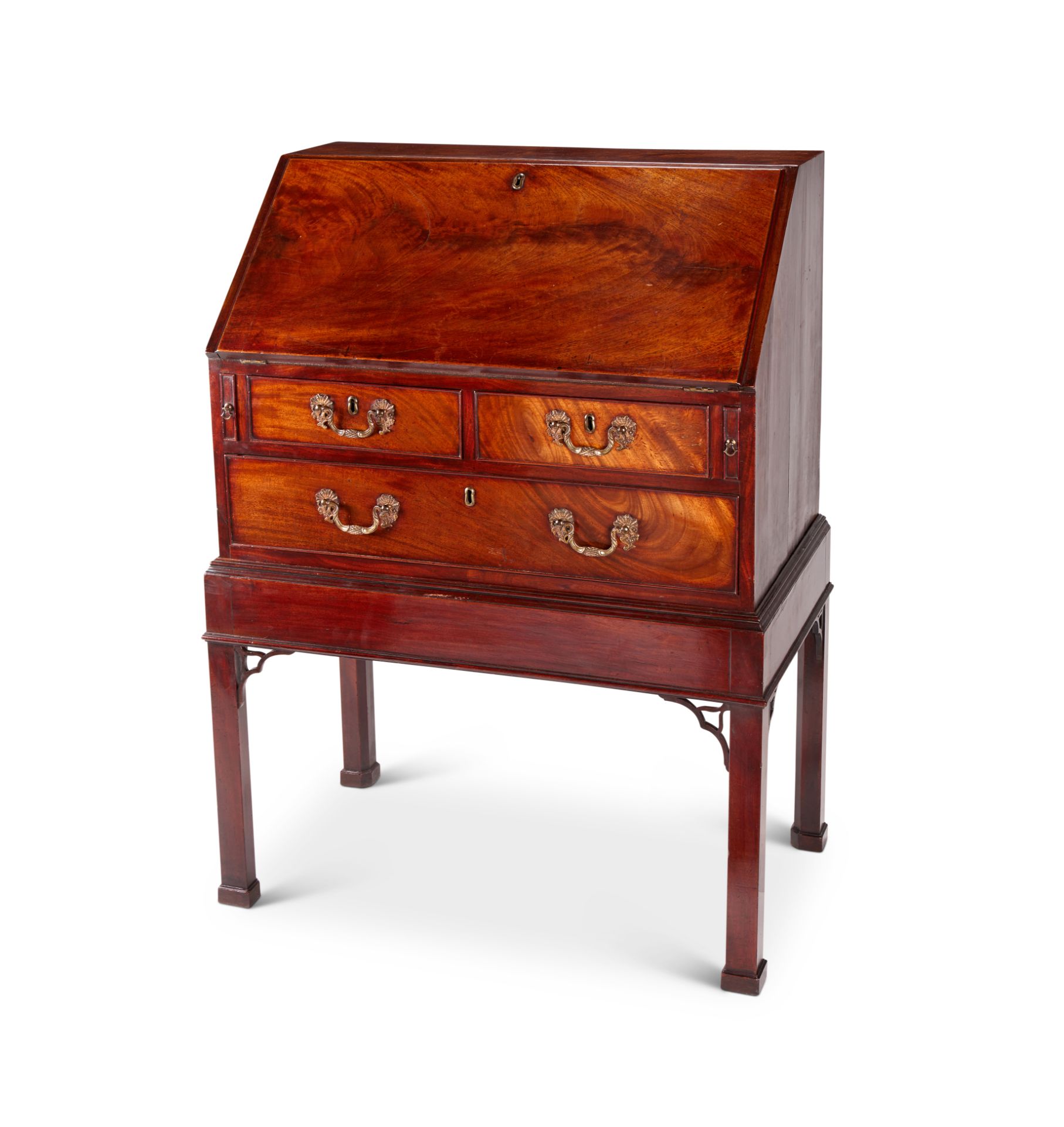 An early George III mahogany bureau on stand