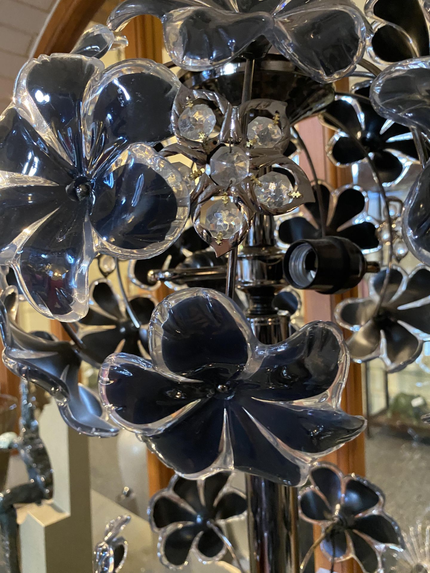 A gun metal and plastic tree two-light lamp with flowerhead decoration - Image 8 of 12