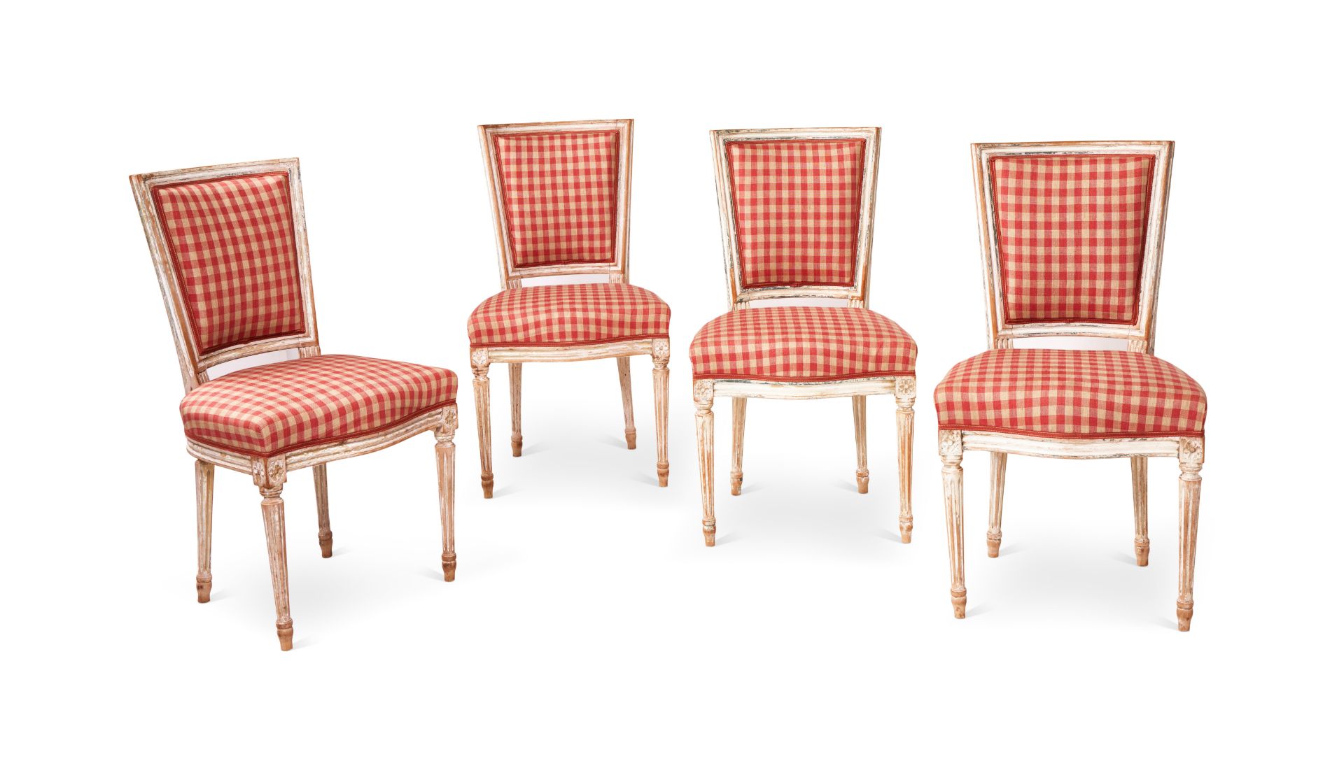 A set of four white painted Louis XVI style upholstered side chairs