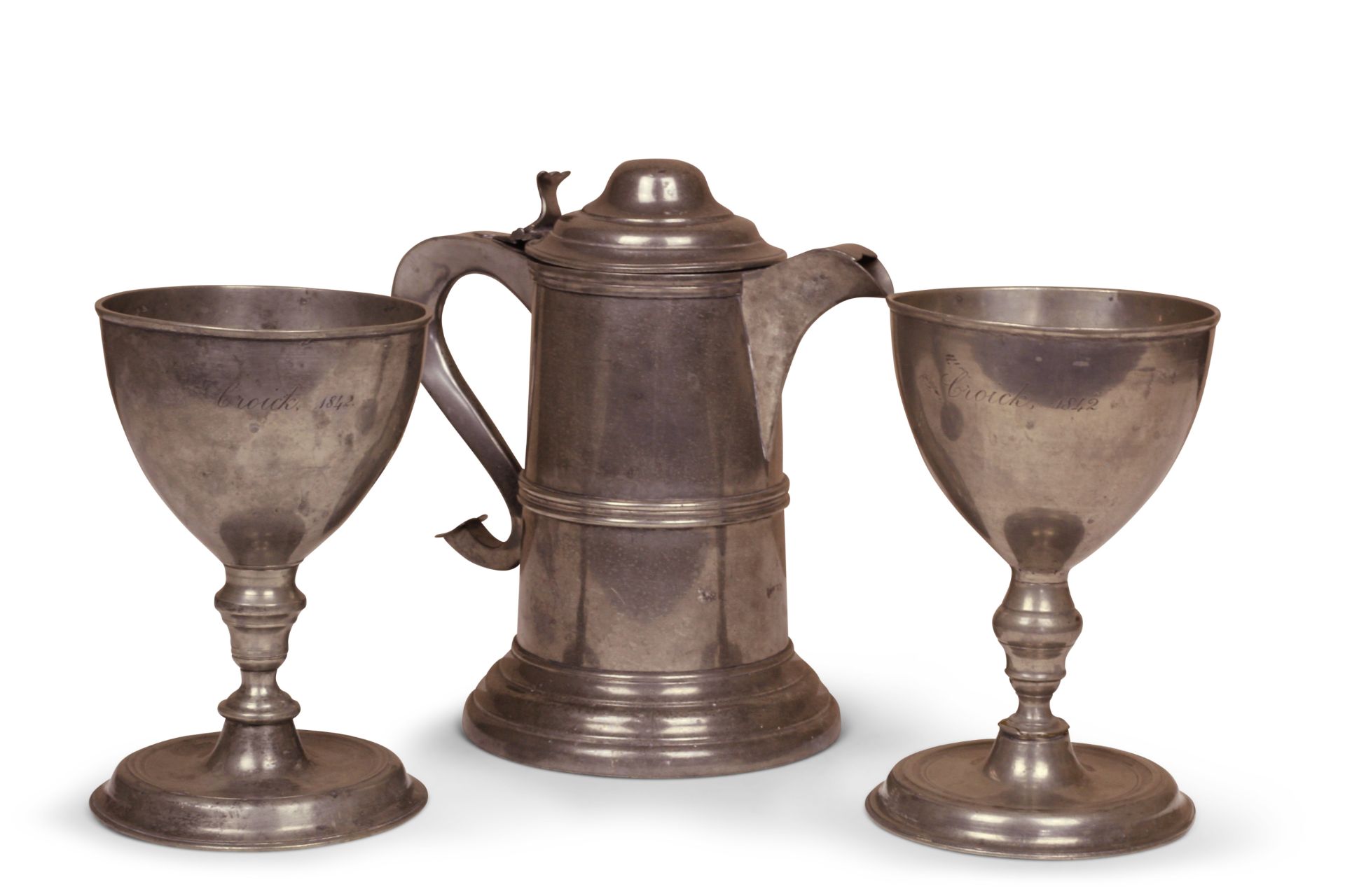 A 19th century pewter communion set