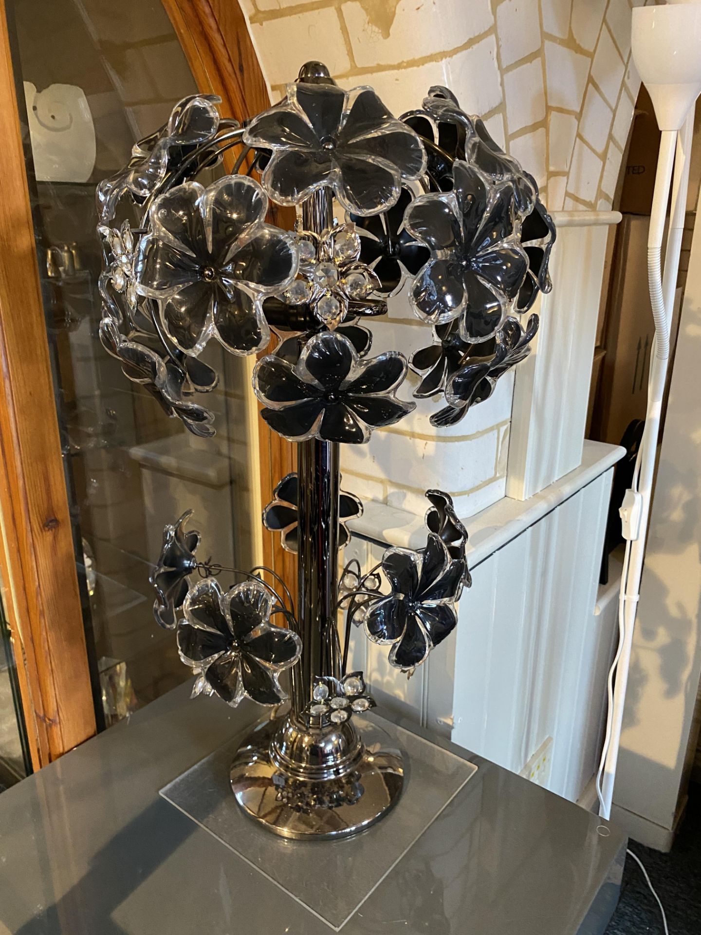 A gun metal and plastic tree two-light lamp with flowerhead decoration - Image 2 of 12