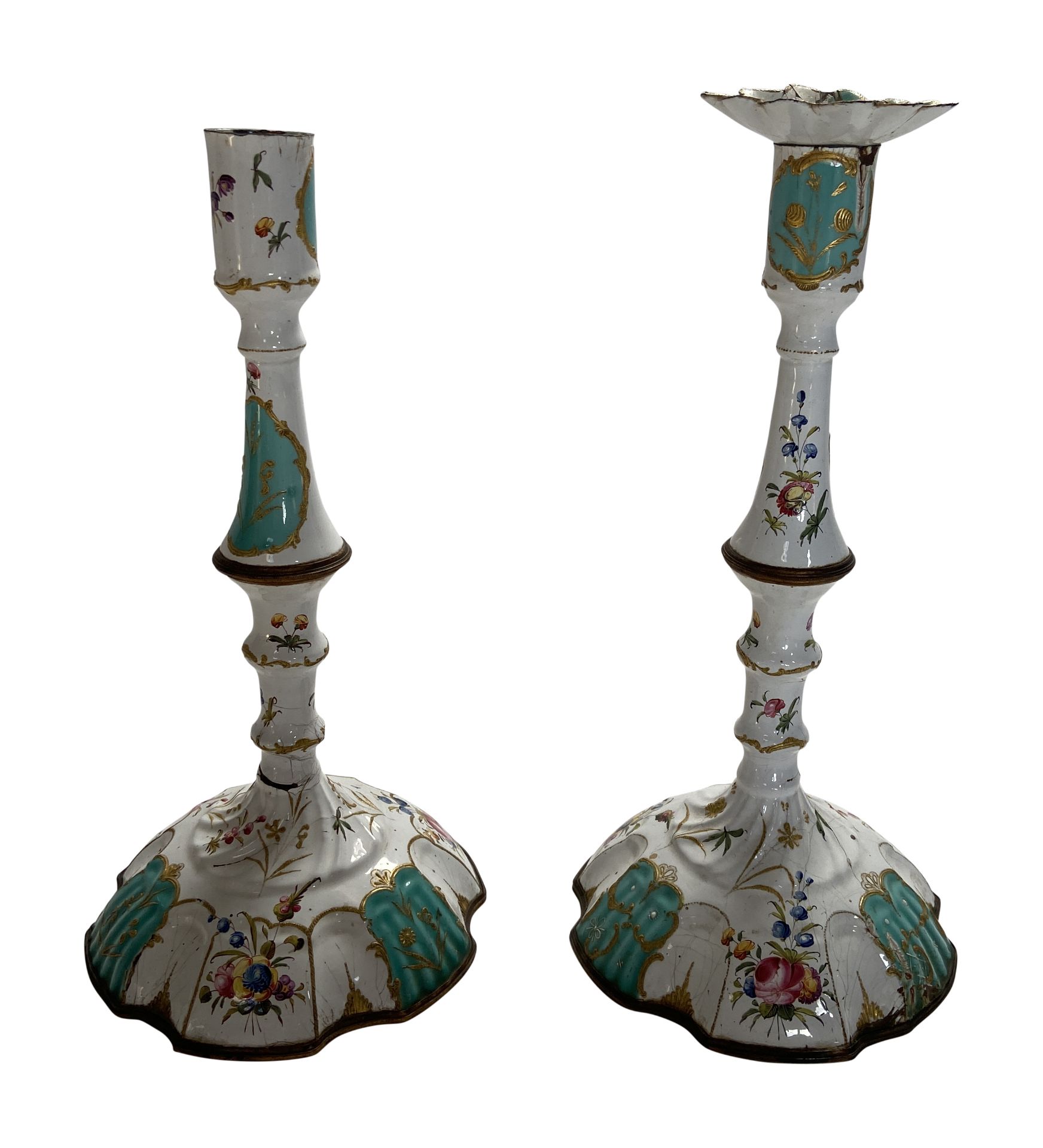 A pair of late 18th century South Staffordshire enamel candlesticks