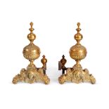 A pair of 19th century brass andirons