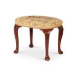 A George II mahogany oval stool