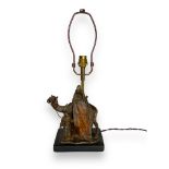 An early 20th century Bergmann style cold painted bronze lamp
