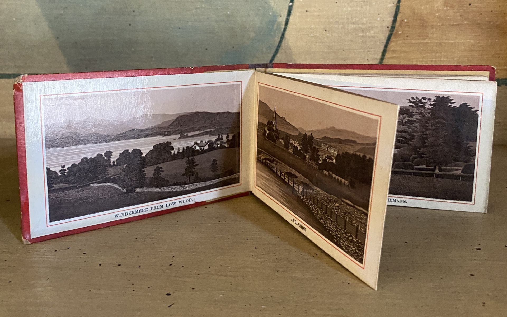 A 19th century framed silhouette of a gentleman and a small souvenir book of '12 Views of the - Image 4 of 6