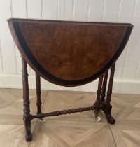 A Victorian burr walnut and ebony banded Sutherland table