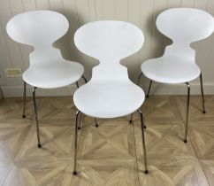 A set of three Fritz Hansen white Ant Chairs designed by Arne Jacobsen Each 40cm wide, 40cm deep,
