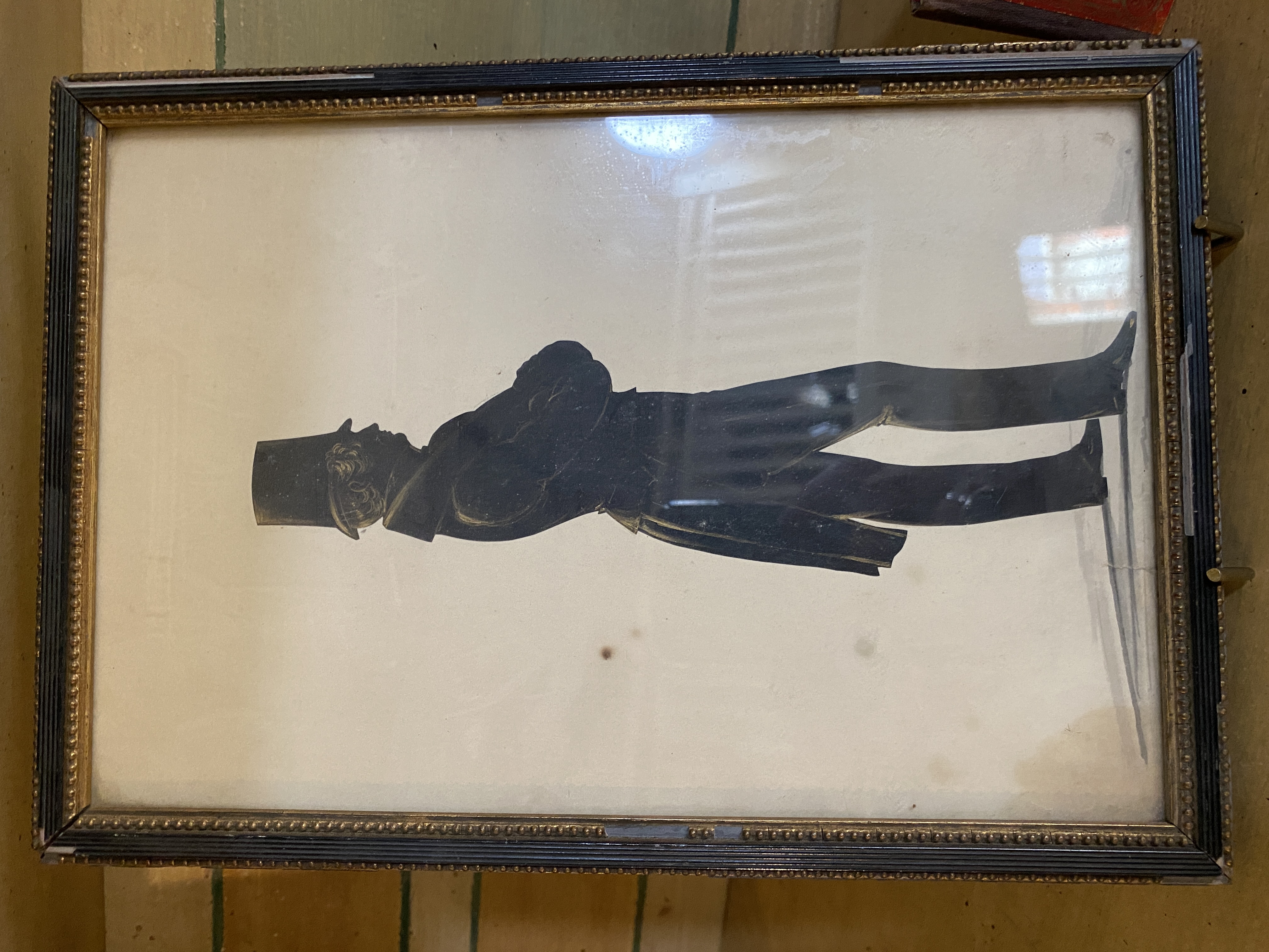 A 19th century framed silhouette of a gentleman and a small souvenir book of '12 Views of the - Image 2 of 6