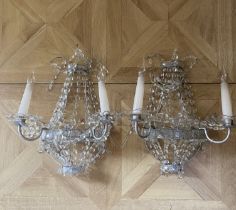 A pair of contemporary silvered metal, beaded and cut glass twin light wall-lights  Of tent and