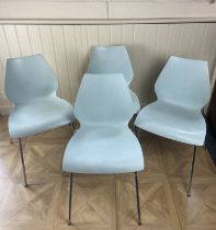 A set of four Kartelli pale blue Maui chairs designed by Vigo Magistretti  Each 47cm wide, 43cm
