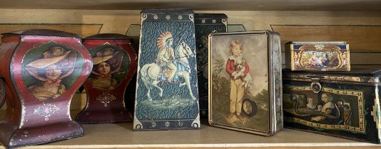 A collection of seven vintage and antique tins
