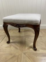 Two 19th century walnut square foot stools, a Victorian oak stool and another stool One with cream