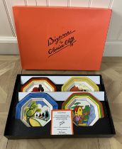 A boxed set of four octagonal Clarice Cliff Bizarre pattern plates by Wedgwood