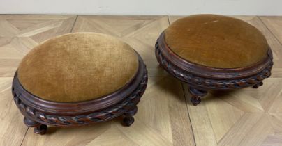 A pair of Victorian small circular mahogany foot stools Each 33cm diameter. (2)