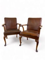 A pair of George III style carved walnut open armchairs, circa 1930