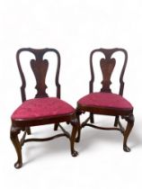 A pair of George I walnut side chairs