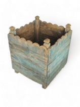 A vintage Versailles blue scrubbed pine garden planter