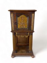 A late 17th / early 18th century Italian walnut and parcel gilt cupboard