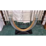 Contemporary Glass Top Console Table with Curved Alloy Stand on Marble Plinth. 73cm high x 122