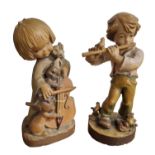 Vintage Ferrandiz Wood Sculpture of a Girl Playing the Cello and a Walter Stahli Carving of a boy