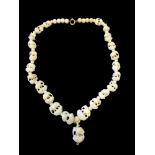 Antique Oriental Bone Necklace with a beaded clasp section then intricately carved elephants of