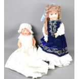 Two vintage Armand Marseille bisque head dolls, model number 351/8k and 390, both with jointed