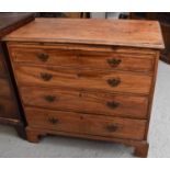 A late Georgian mahogany bachelors chest with brush slide above long graduated drawers, raised on