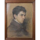 An early 20th century portrait of a gentleman, pastel on paper, unsigned.