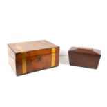 A Victorian walnut and brass bound writing box opening to reveal a leather writing surface pen and