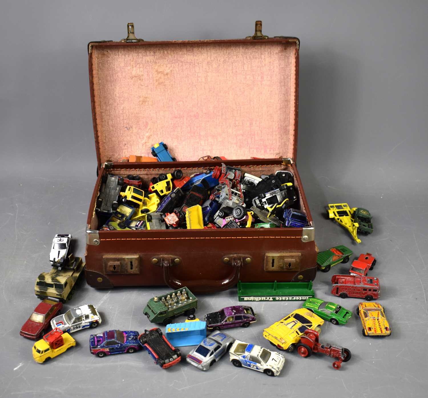 A group of diecast vehicles to include example by Corgi, Matchbox and others.