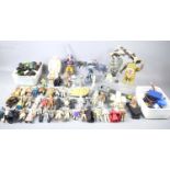 A group of vintage action figures and vehicles to include Star Wars speeder bikes 1985, Star Wars