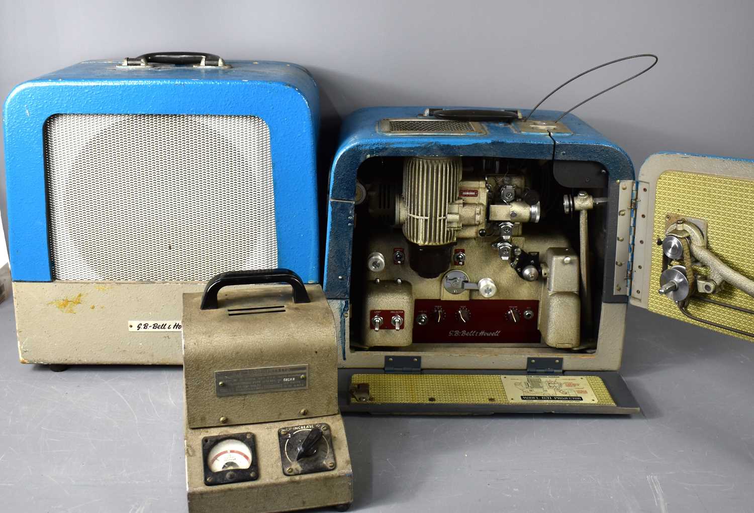 A Bell & Howell 16mm film projector, model 631 together with a Bell & Howell speaker box and