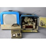 A Bell & Howell 16mm film projector, model 631 together with a Bell & Howell speaker box and