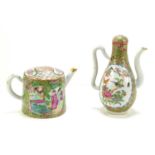 A Chinese Canton Famille Rose tea pot and cover, 9cm tall, together with a small wine pot and cover,