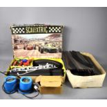 A vintage Scalextric 31 set together with other Scalextric items.