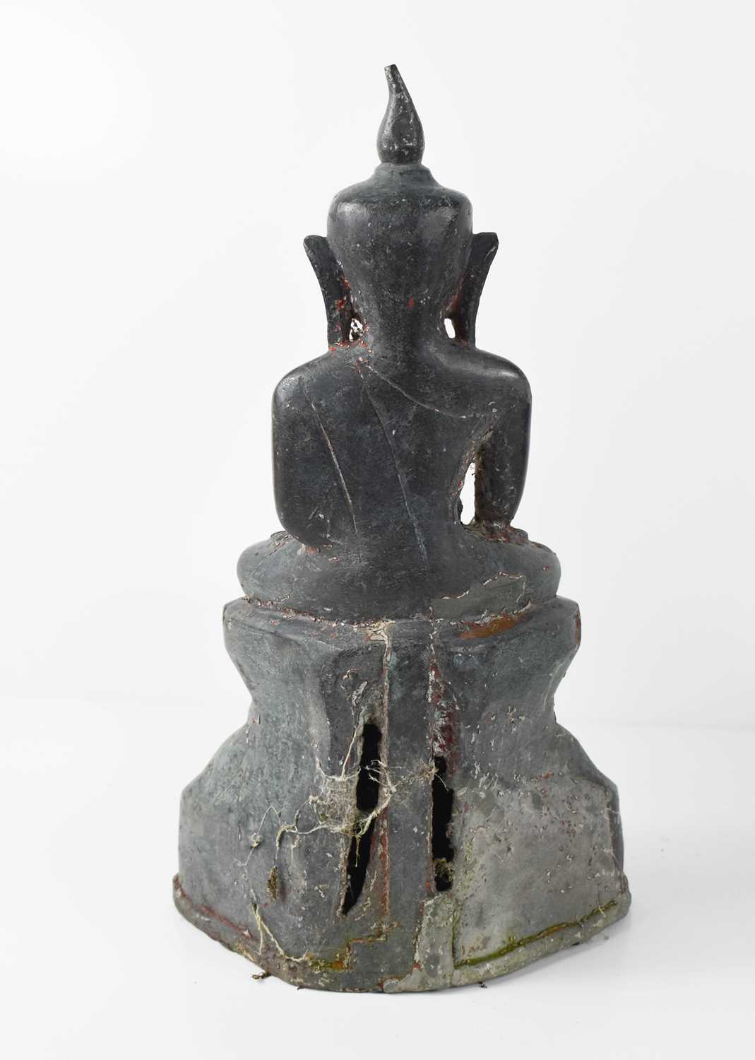 A bronze statue of the Buddha in Bhumisparsha Mudra pose, with serene face, sat cross legged on a - Image 2 of 2